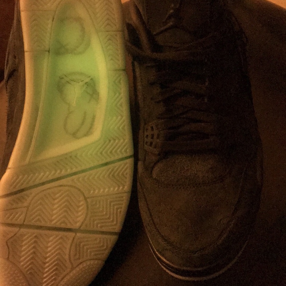 Jordan “kaws” sawed black glow in the dark